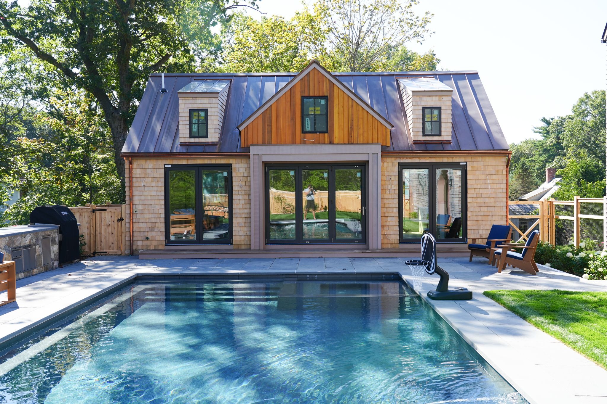 A pool house is one of many types of ADUs in Massachusetts