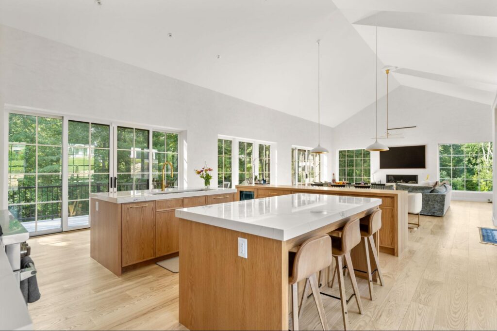 Open-concept kitchen by Oak, a Modern New England design-build firm in Hingham, MA.